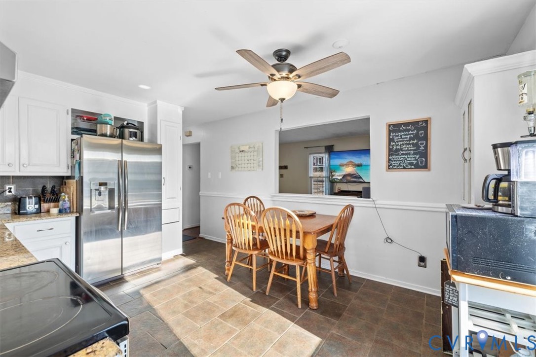 12505 Mandolin Drive Midlothian, VA 23113 - Photo 6 of 26 a view of a dining room with furniture