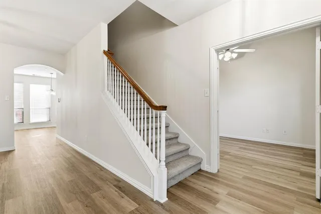 a view of entryway with wooden floor