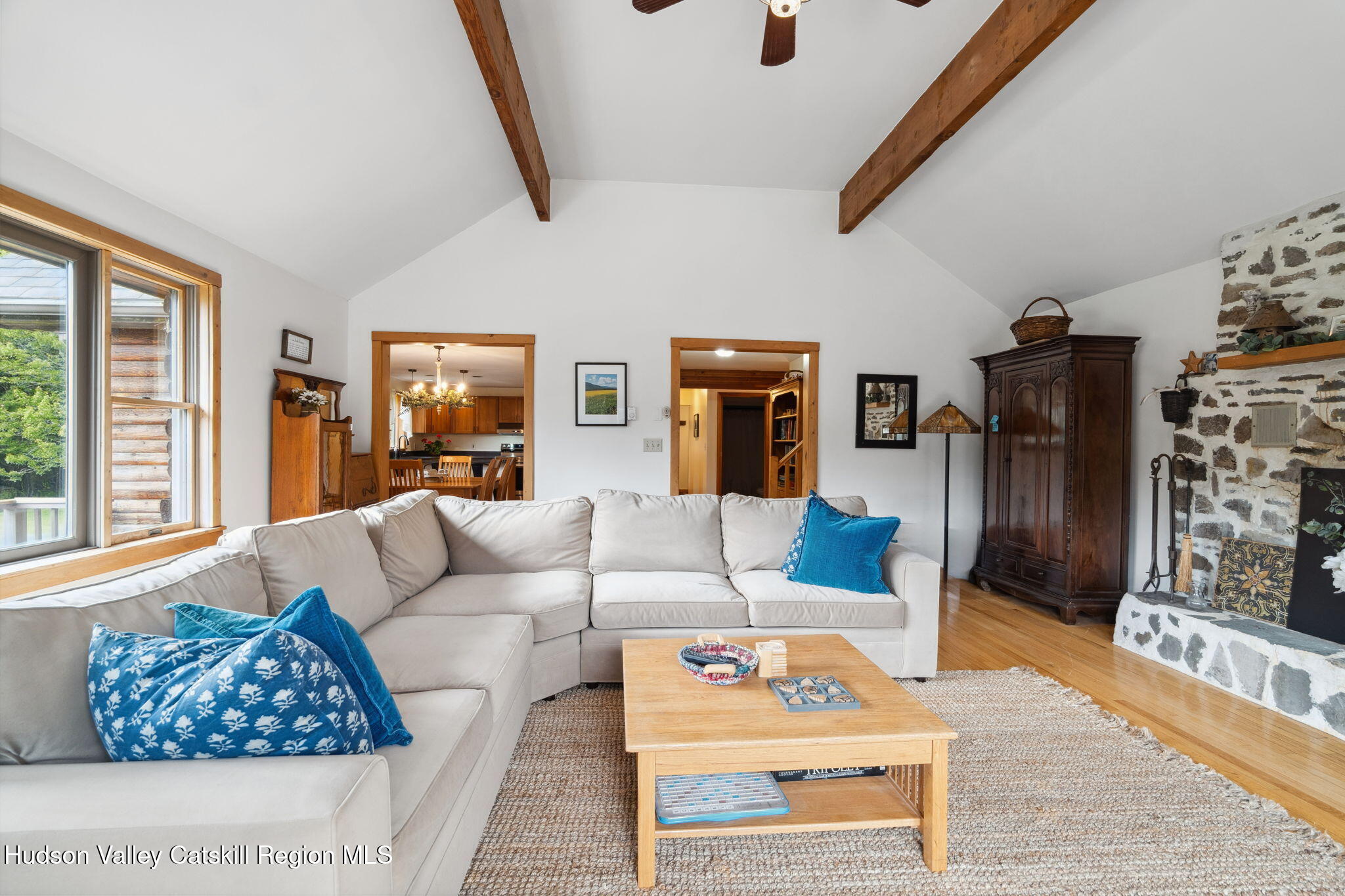 552 Bear Kill Road Gilboa, NY 12076 - Photo 30 of 63 a living room with furniture and a fireplace