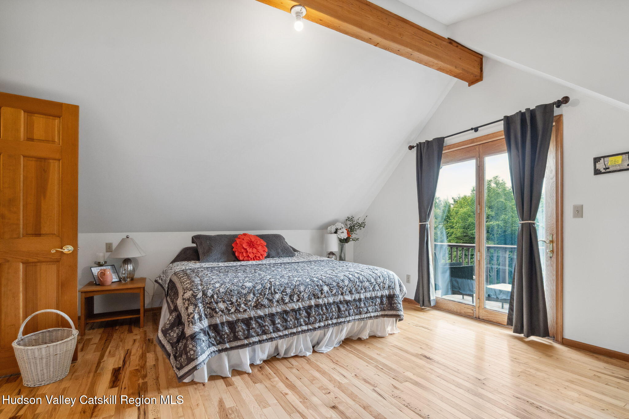 552 Bear Kill Road Gilboa, NY 12076 - Photo 34 of 63 a bedroom with a bed and wooden floor