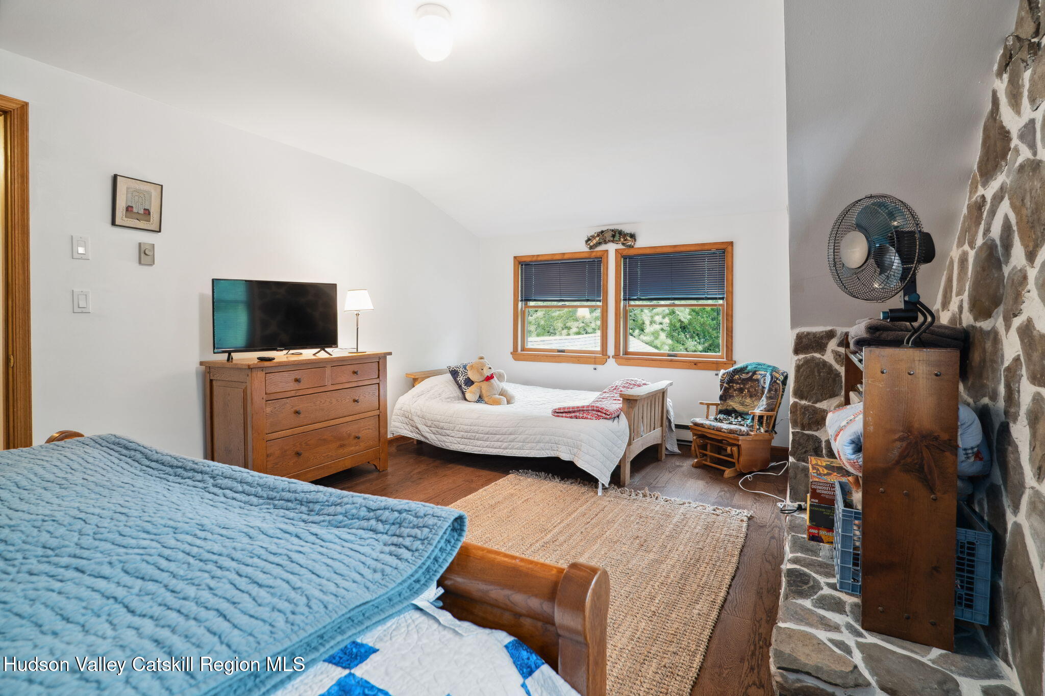 552 Bear Kill Road Gilboa, NY 12076 - Photo 43 of 63 a living room with furniture and a flat screen tv