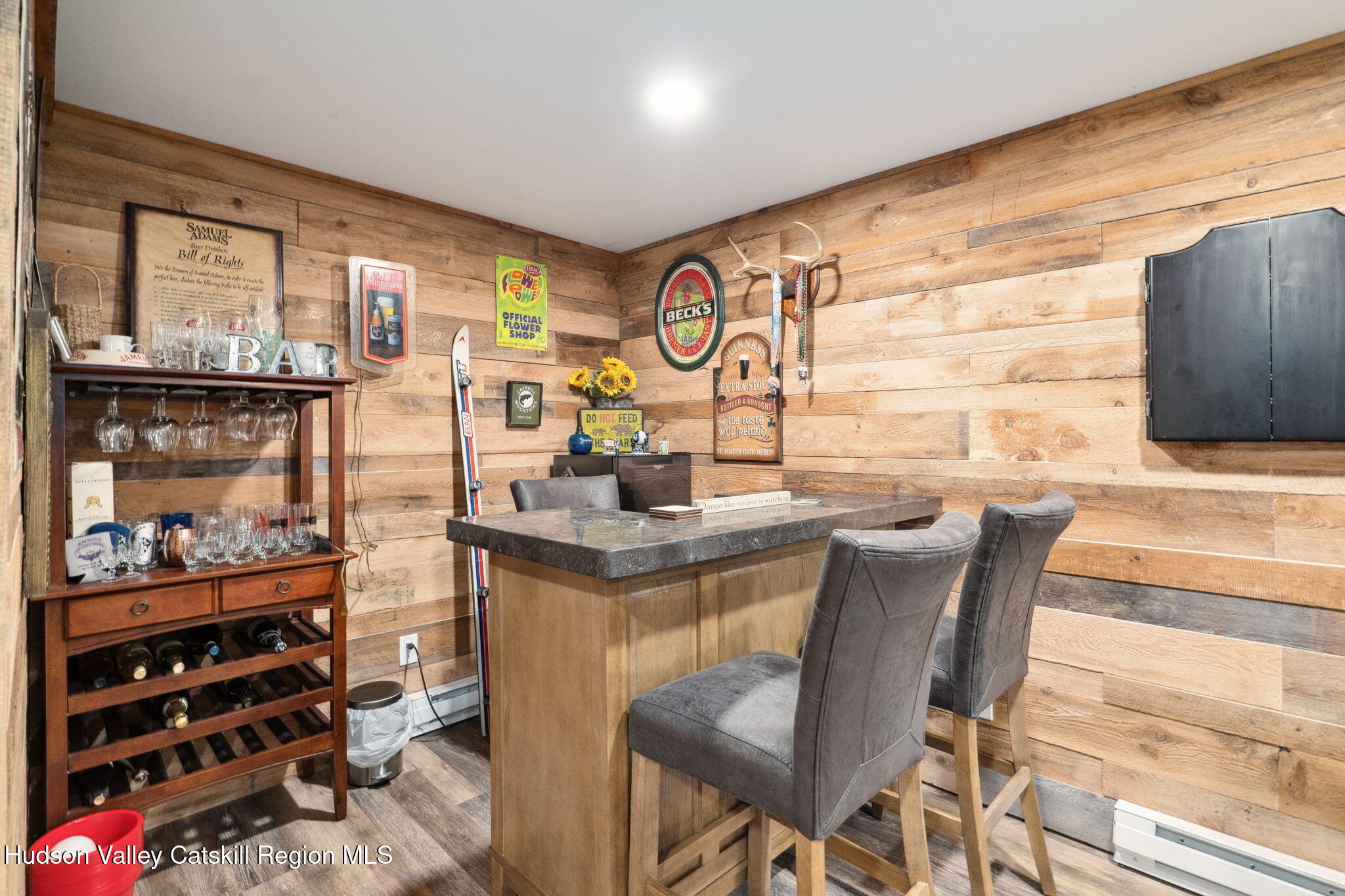 552 Bear Kill Road Gilboa, NY 12076 - Photo 49 of 63 a dining hall with stainless steel appliances granite countertop a stove and a chair