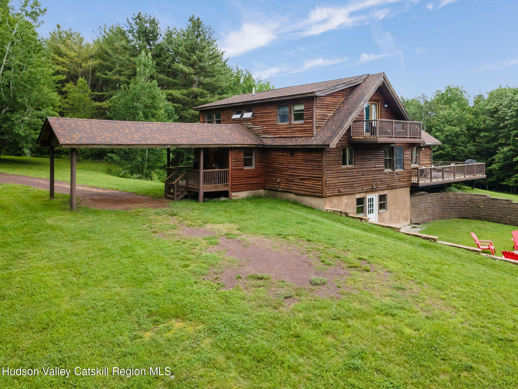 552 Bear Kill Road Gilboa, NY 12076 - Photo 57 of 63 a view of a house with a yard and sitting area