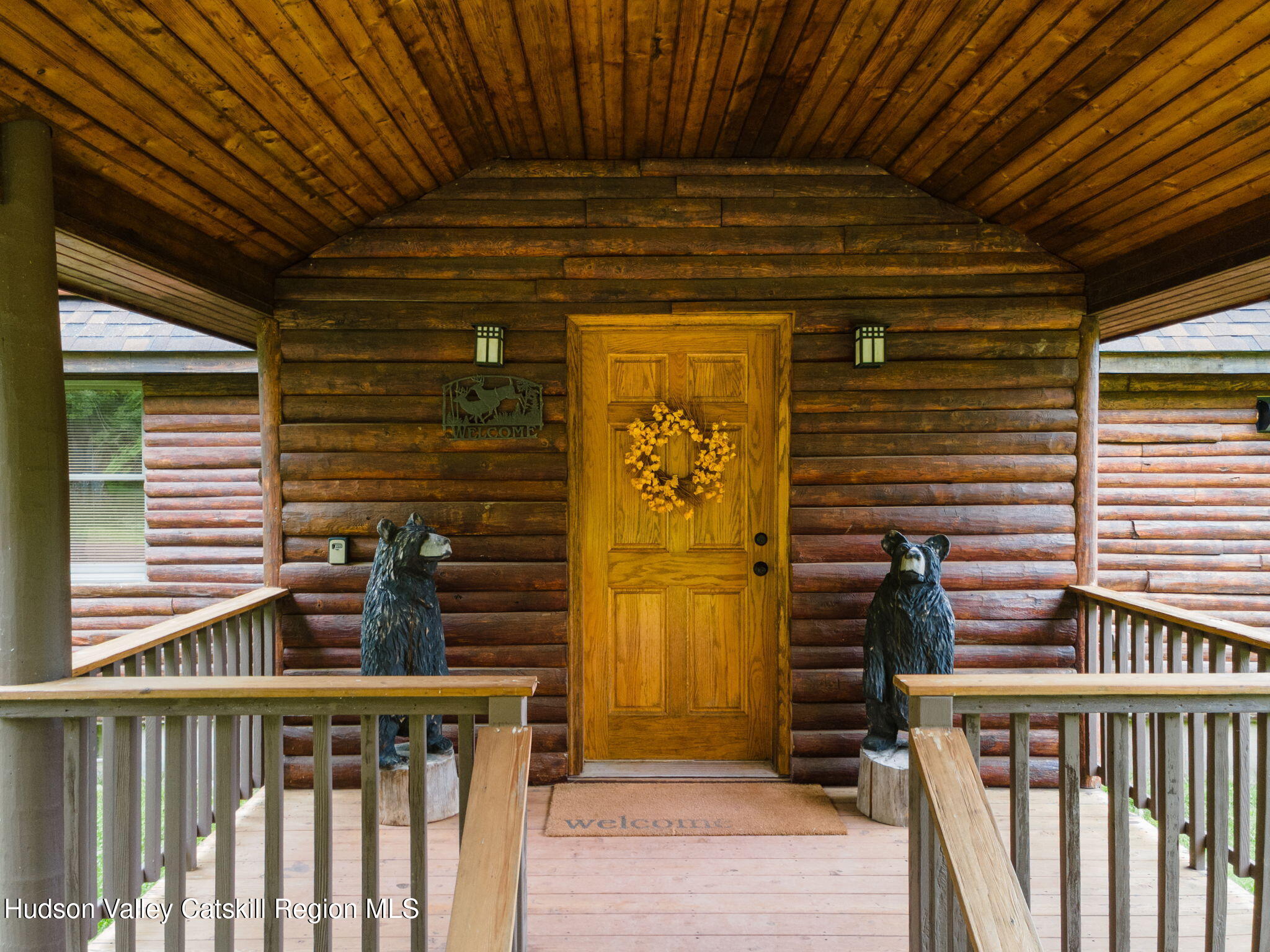 552 Bear Kill Road Gilboa, NY 12076 - Photo 7 of 63 a view of a door and wooden deck