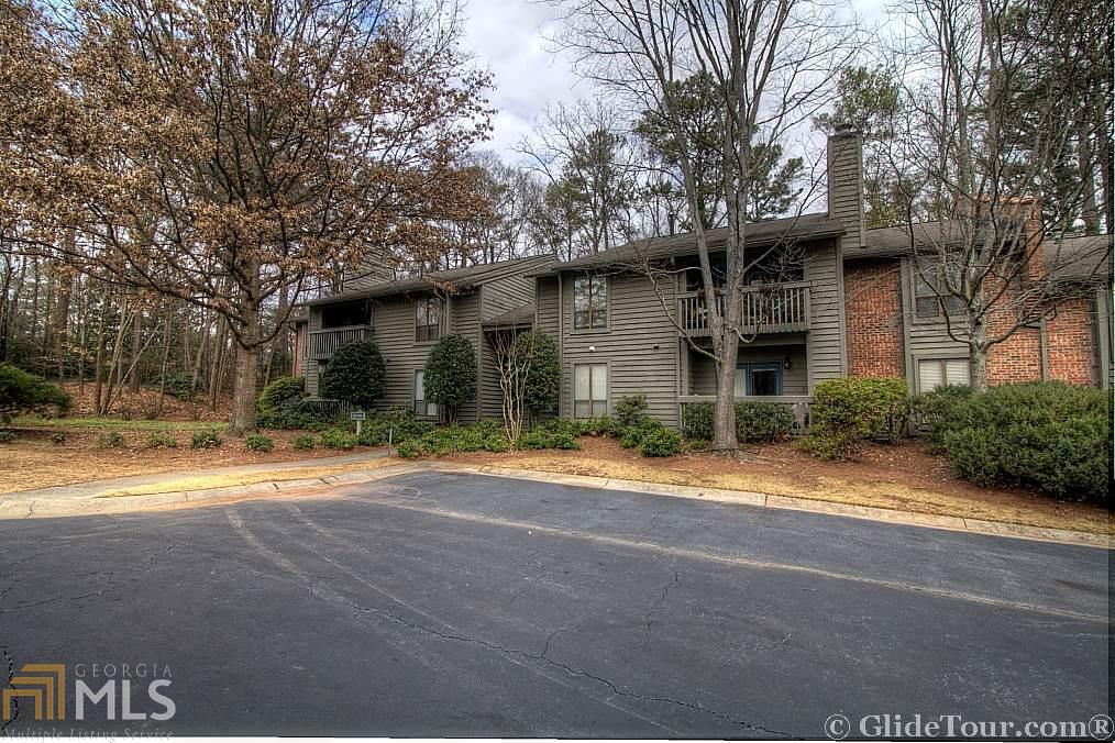 1307 McClelen Way Decatur, GA 30033 - Photo 1 of 1 a front view of a house with a yard and garage