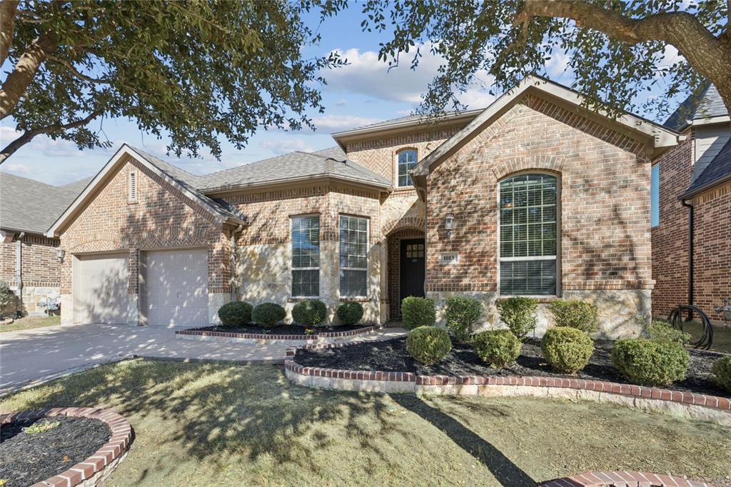 1013 Knoxbridge Road Forney, TX 75126 - Photo 2 of 39 a front view of a house with a yard