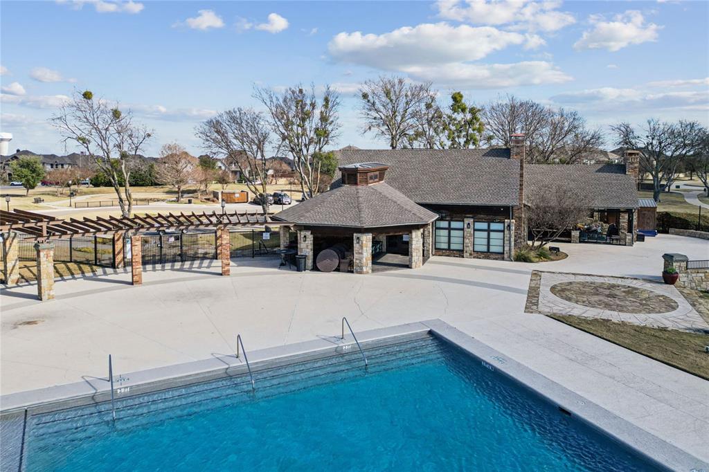 1013 Knoxbridge Road Forney, TX 75126 - Photo 34 of 39 a front view of a house with garden