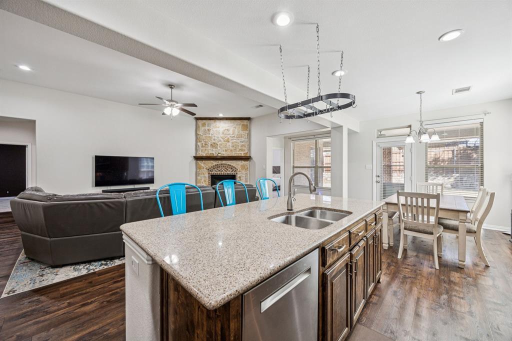 1013 Knoxbridge Road Forney, TX 75126 - Photo 6 of 39 a view of a dining room with furniture window and wooden floor