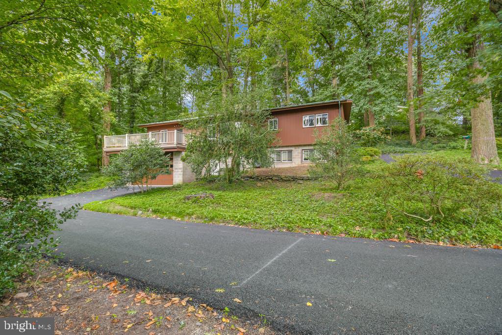111 Ashmead Road Cheltenham, PA 19012 - Photo 1 of 18 a view of a house with a yard and street