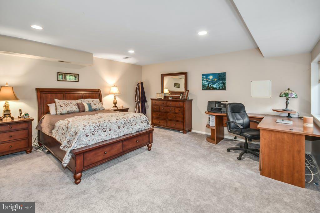 111 Ashmead Road Cheltenham, PA 19012 - Photo 12 of 18 a bedroom with a bed and furniture
