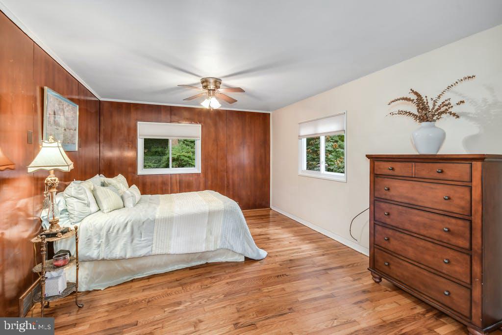 111 Ashmead Road Cheltenham, PA 19012 - Photo 14 of 18 a bedroom with a large bed and a window
