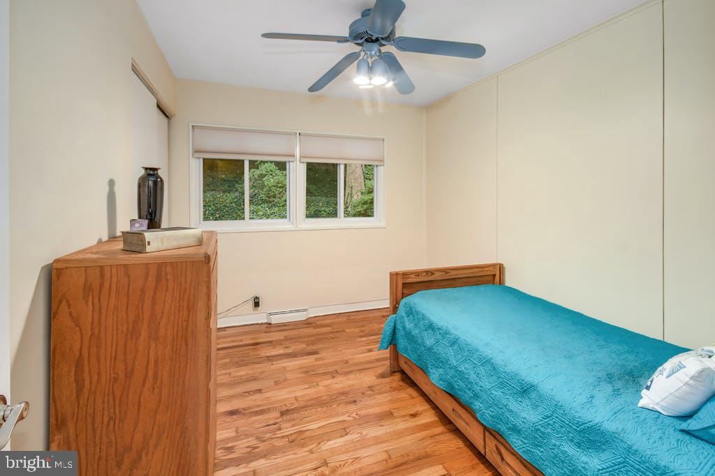 111 Ashmead Road Cheltenham, PA 19012 - Photo 15 of 18 a bedroom with a bed and window