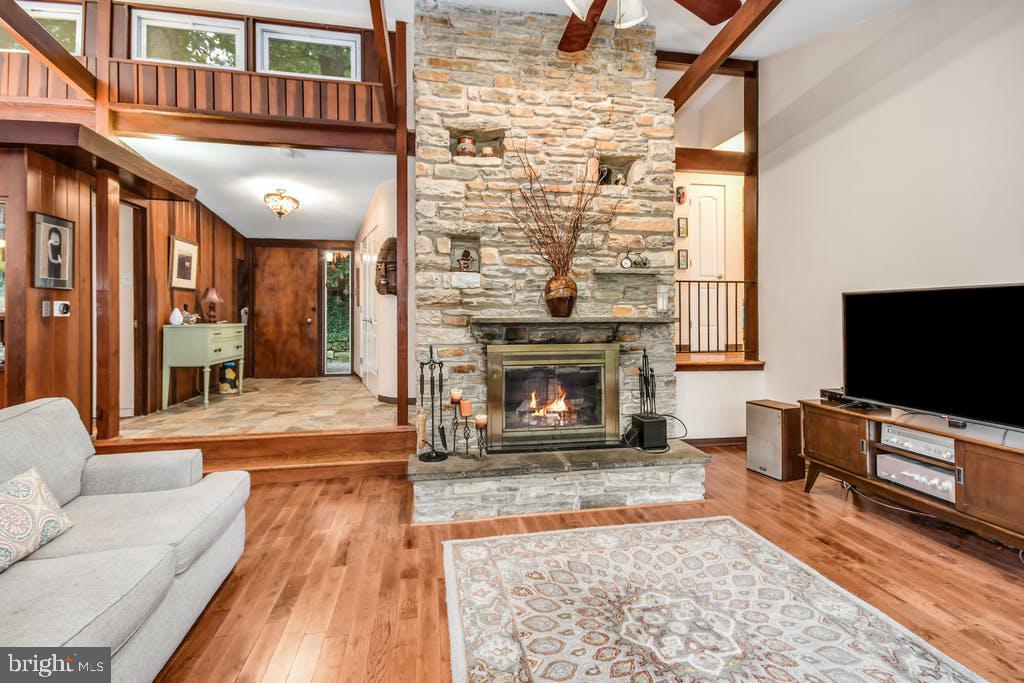 111 Ashmead Road Cheltenham, PA 19012 - Photo 7 of 18 a living room with furniture and a fireplace
