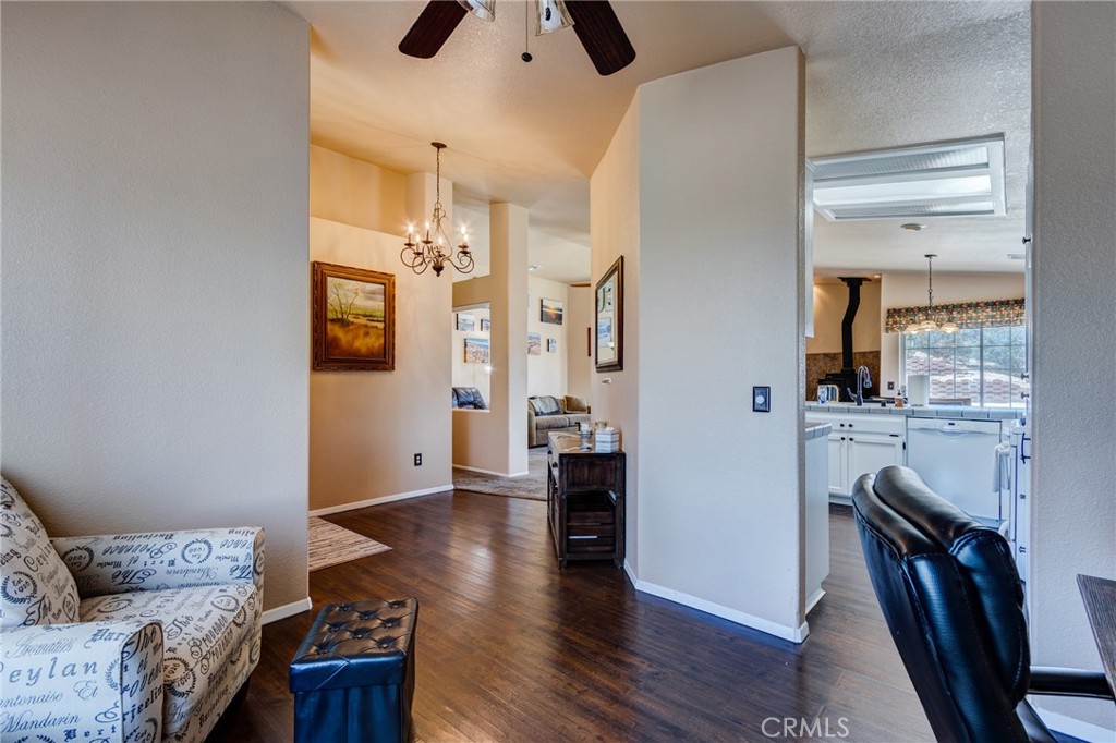 7170 Joshua Road Oak Hills, CA 92344 - Photo 24 of 59 a view of livingroom with furniture and wooden floor
