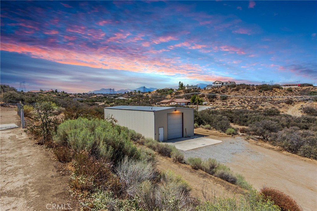 7170 Joshua Road Oak Hills, CA 92344 - Photo 4 of 59 a view of a terrace with a garden