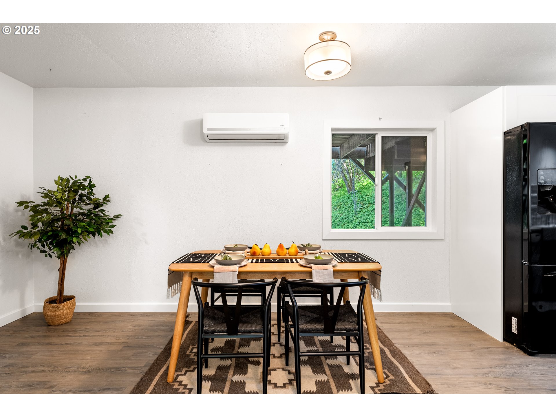 988 Savage Creek Road Grants Pass, OR 97527 - Photo 27 of 48 a dining room with furniture and wooden floor