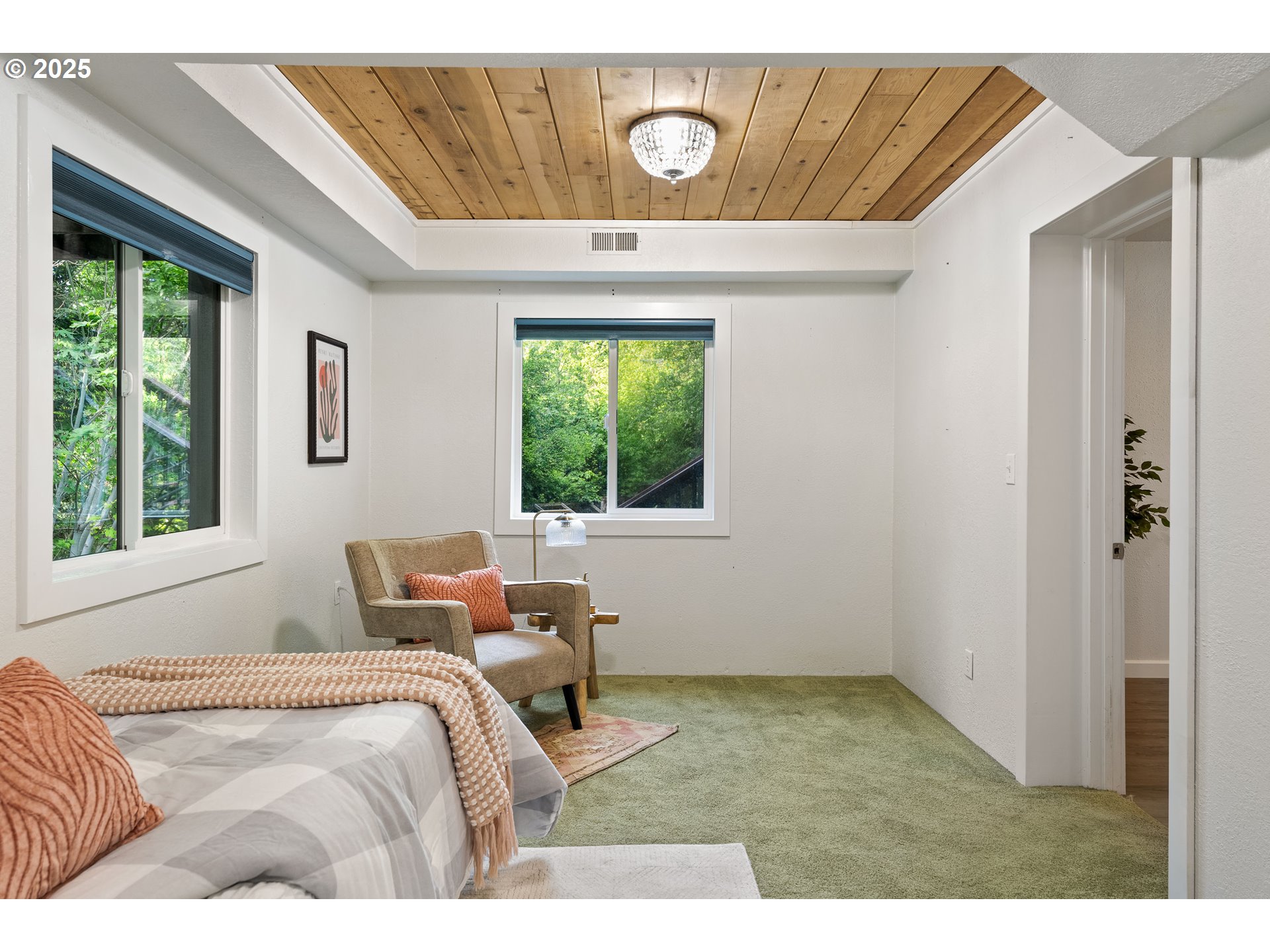 988 Savage Creek Road Grants Pass, OR 97527 - Photo 30 of 48 a bedroom with a bed and window