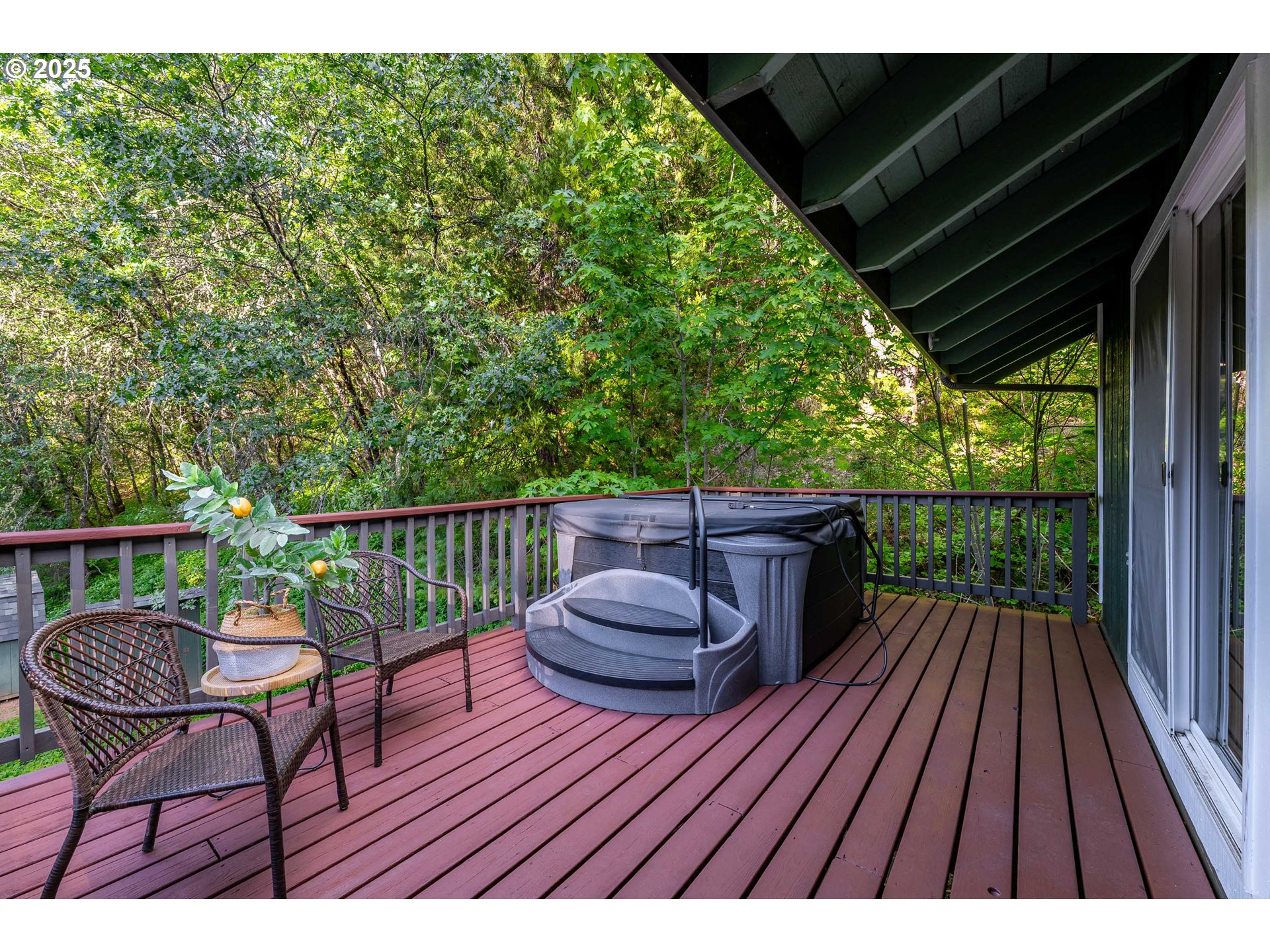 988 Savage Creek Road Grants Pass, OR 97527 - Photo 43 of 48 a view of balcony with wooden floor and outdoor seating