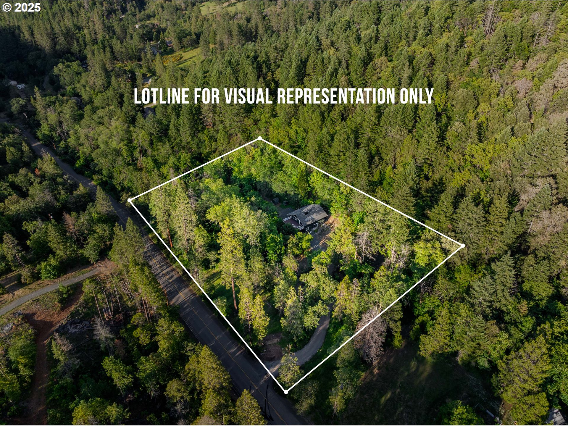 988 Savage Creek Road Grants Pass, OR 97527 - Photo 47 of 48 a city view from a balcony