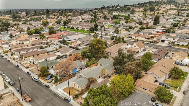 an aerial view of residential building and parking space