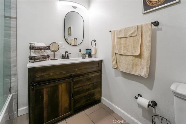 a view of a dining room with furniture and window
