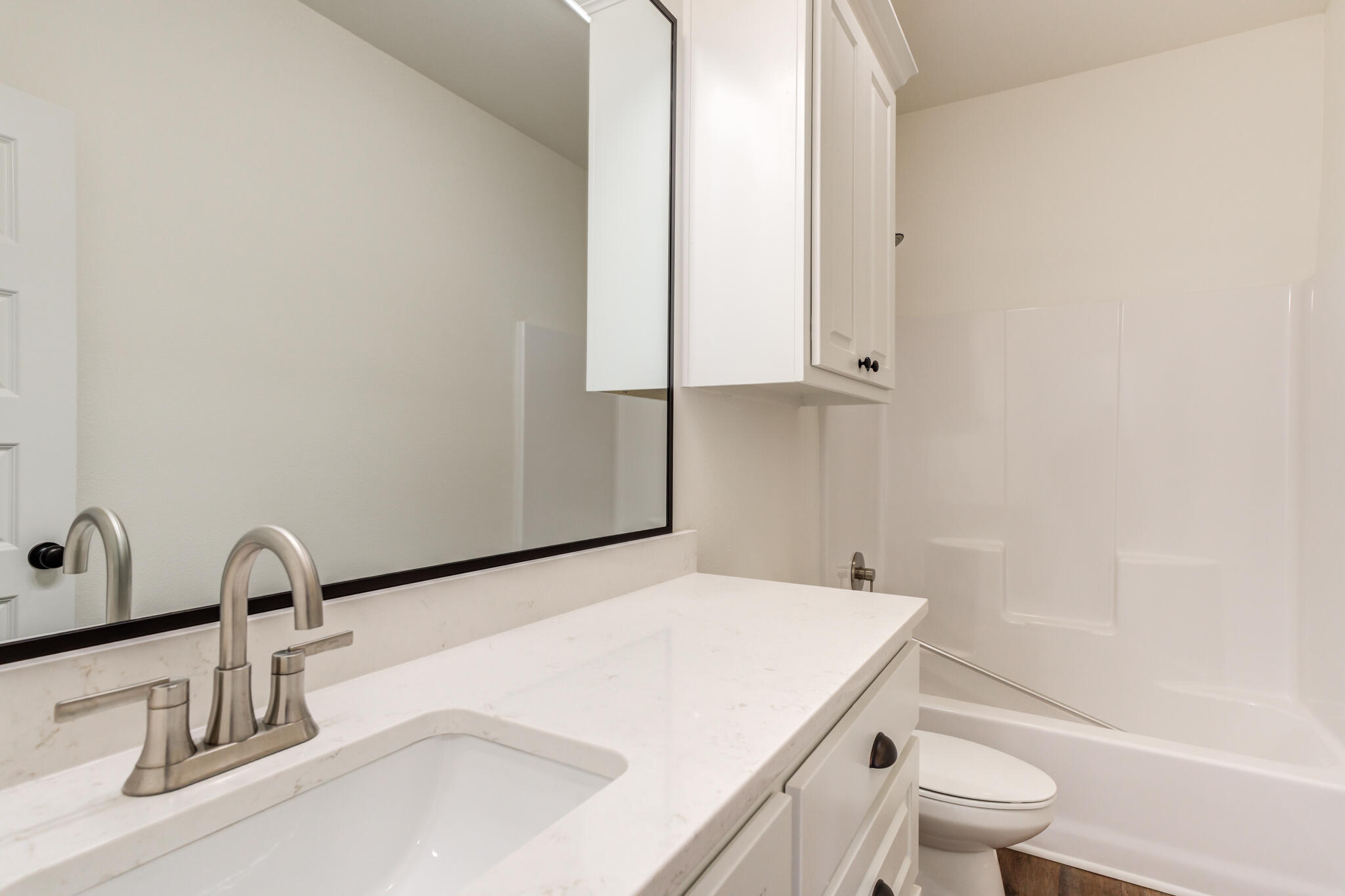 3710 144th Street Lubbock, TX 79423 - Photo 36 of 53 a bathroom with a sink and a toilet
