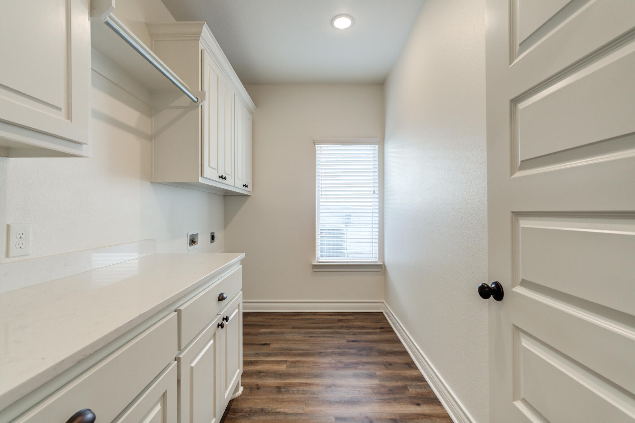 3710 144th Street Lubbock, TX 79423 - Photo 44 of 53 a view of a kitchen with wooden floor and staircase