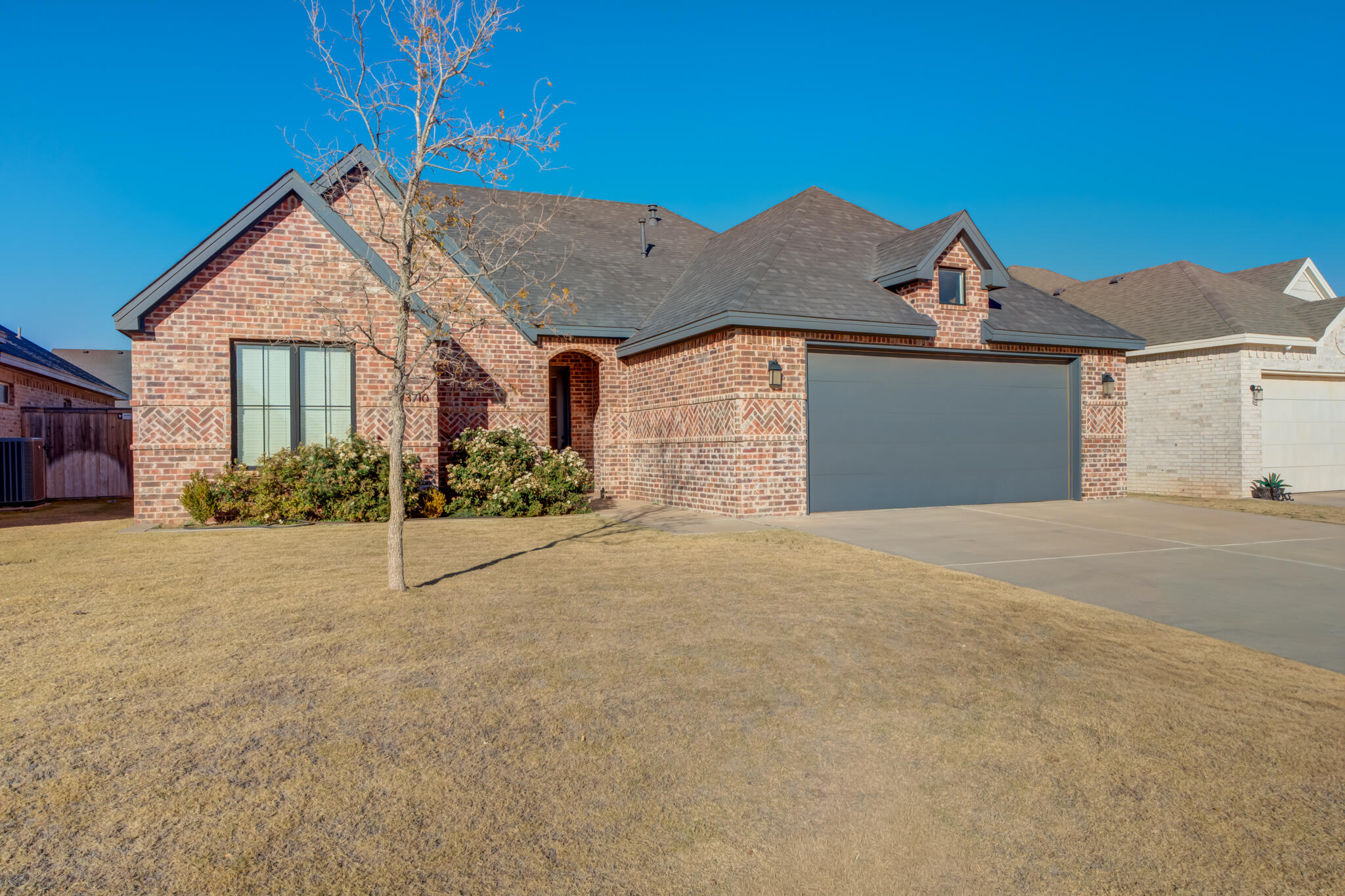 3710 144th Street Lubbock, TX 79423 - Photo 8 of 53 front view of a house with a yard