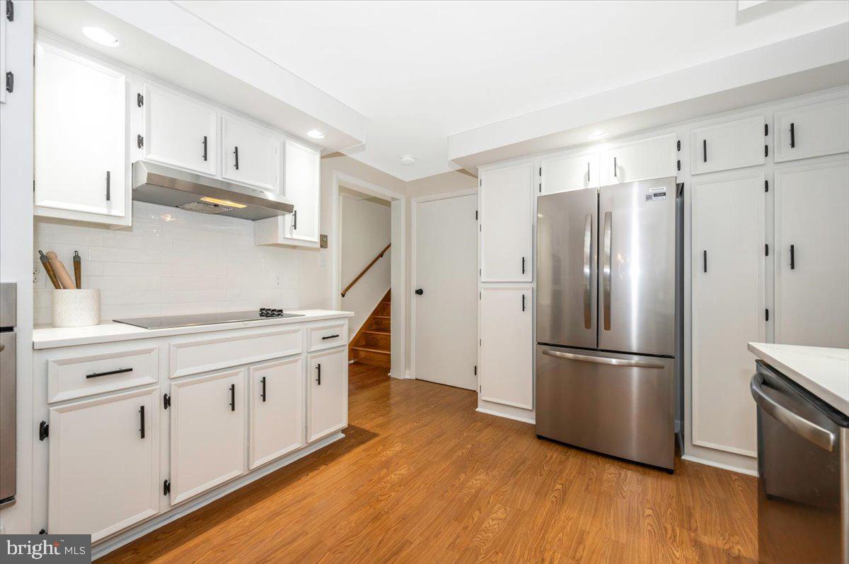 13449 Edgemont Road Smithsburg, MD 21783 - Photo 20 of 70 a kitchen with stainless steel appliances a refrigerator sink and cabinets
