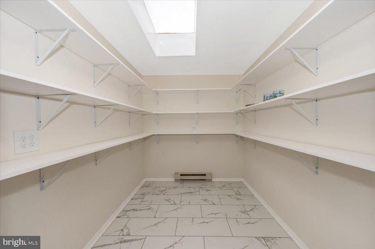 13449 Edgemont Road Smithsburg, MD 21783 - Photo 23 of 70 a view of a room with racks on the wall