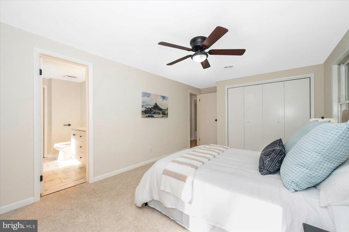 13449 Edgemont Road Smithsburg, MD 21783 - Photo 28 of 70 a bedroom with a bed and a painting on the wall