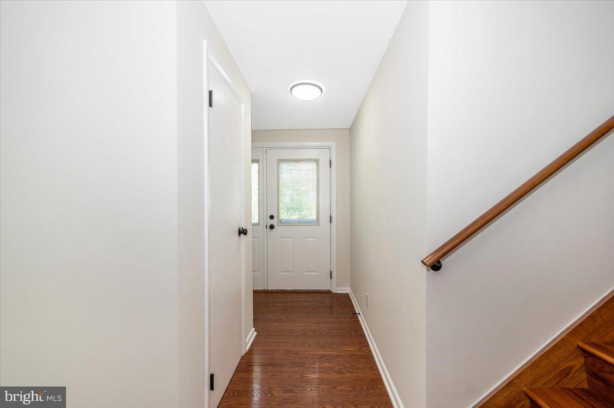 13449 Edgemont Road Smithsburg, MD 21783 - Photo 3 of 70 a view of a hallway with wooden floor and staircase