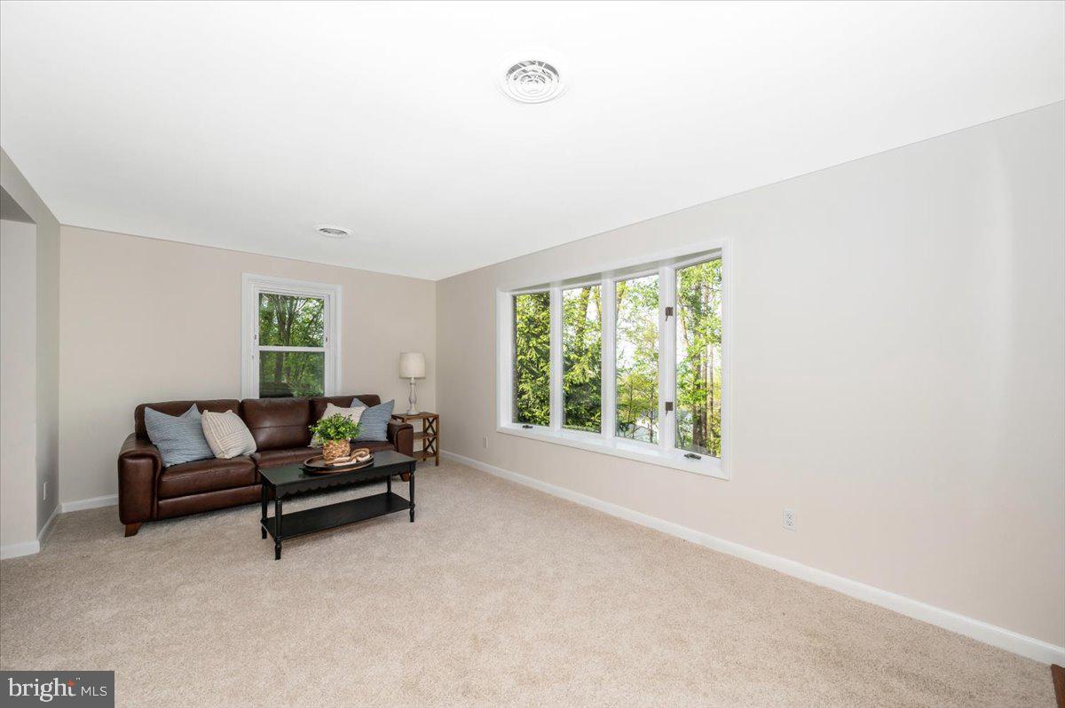 13449 Edgemont Road Smithsburg, MD 21783 - Photo 4 of 70 a living room with furniture and a window