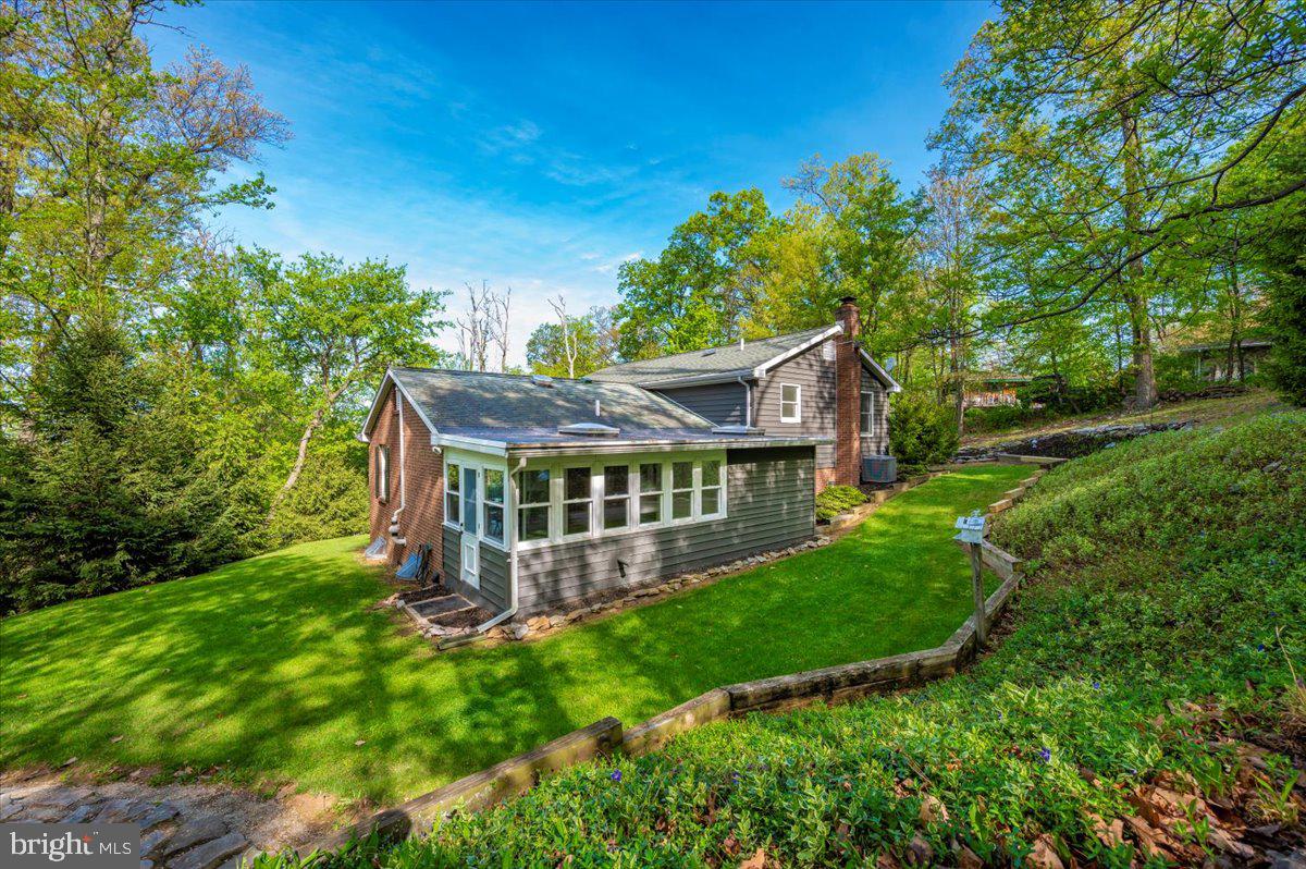 13449 Edgemont Road Smithsburg, MD 21783 - Photo 49 of 70 front view of a house with a yard