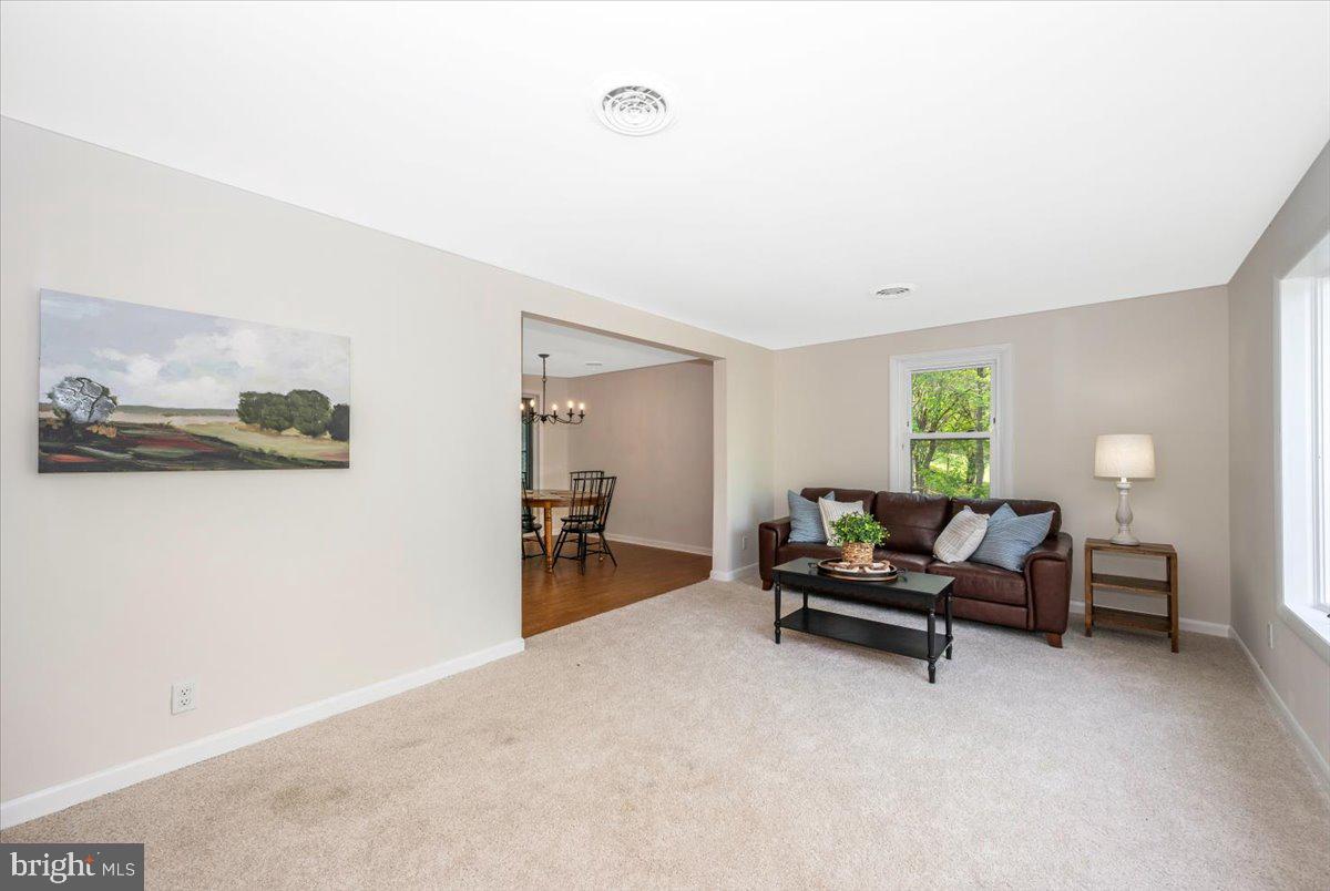 13449 Edgemont Road Smithsburg, MD 21783 - Photo 5 of 70 a living room with furniture and a window
