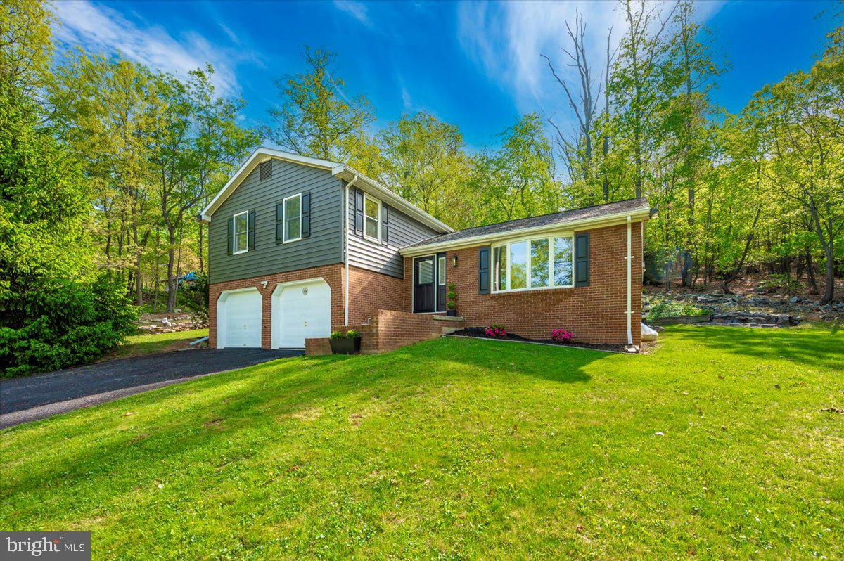 13449 Edgemont Road Smithsburg, MD 21783 - Photo 65 of 70 a view of a house with a big yard plants and large trees