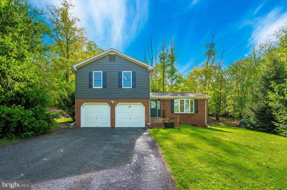 13449 Edgemont Road Smithsburg, MD 21783 - Photo 66 of 70 a front view of house with yard and green space