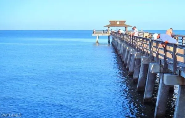 a view of a hardwood deck and an ocean view