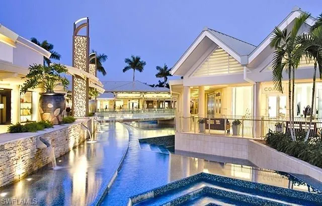 a view of a living room and dining room