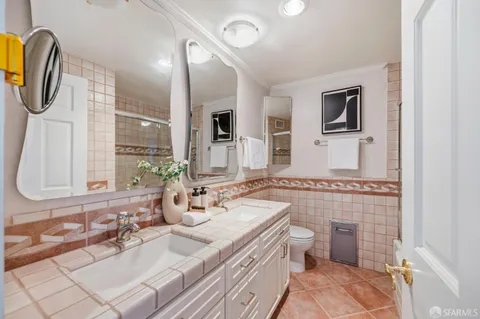 a bathroom with a bathtub and shower