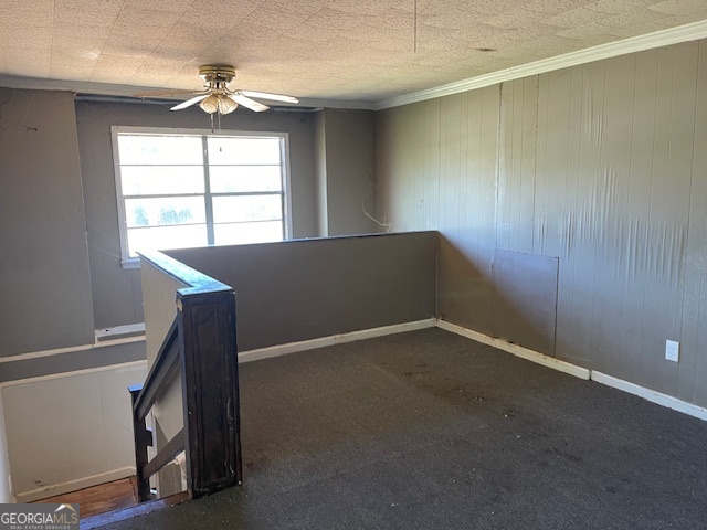 1427 Woodland Road Thomaston, GA 30286 - Photo 15 of 16 an empty room with windows and chandelier fan