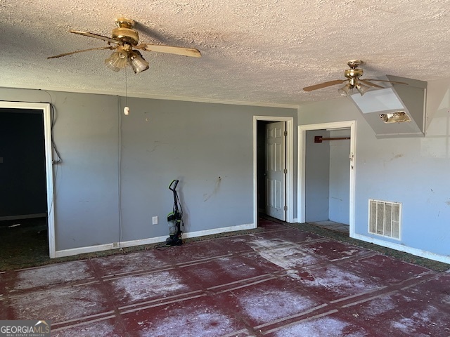 1427 Woodland Road Thomaston, GA 30286 - Photo 4 of 16 a view of a livingroom with wooden floor and a ceiling fan
