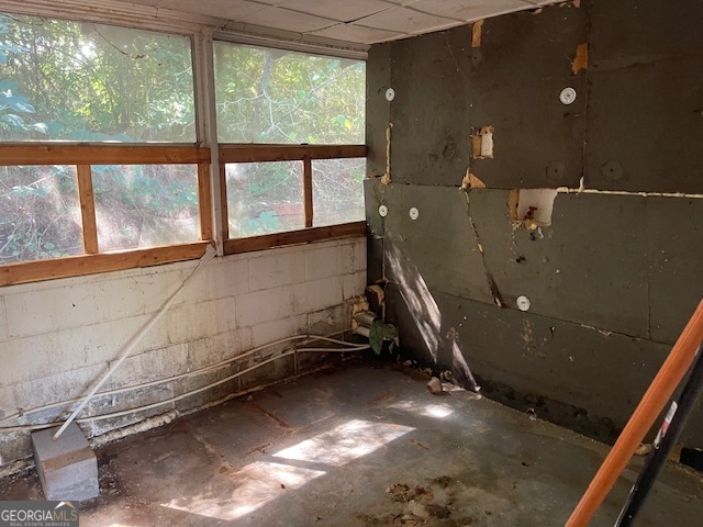 1427 Woodland Road Thomaston, GA 30286 - Photo 7 of 16 a view of a room with gym equipment