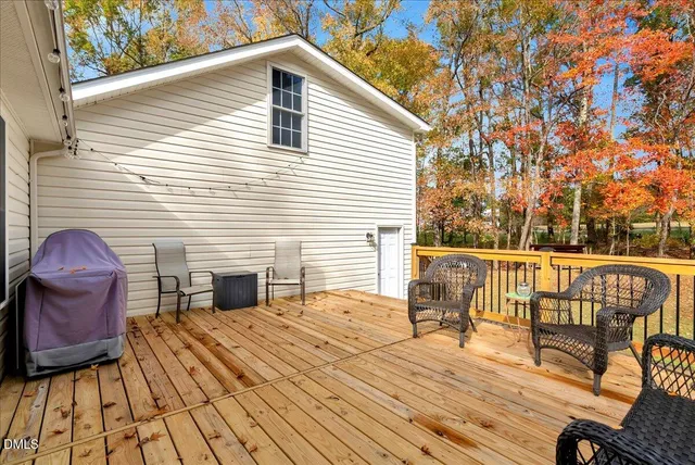 a view of a two chairs in the balcony