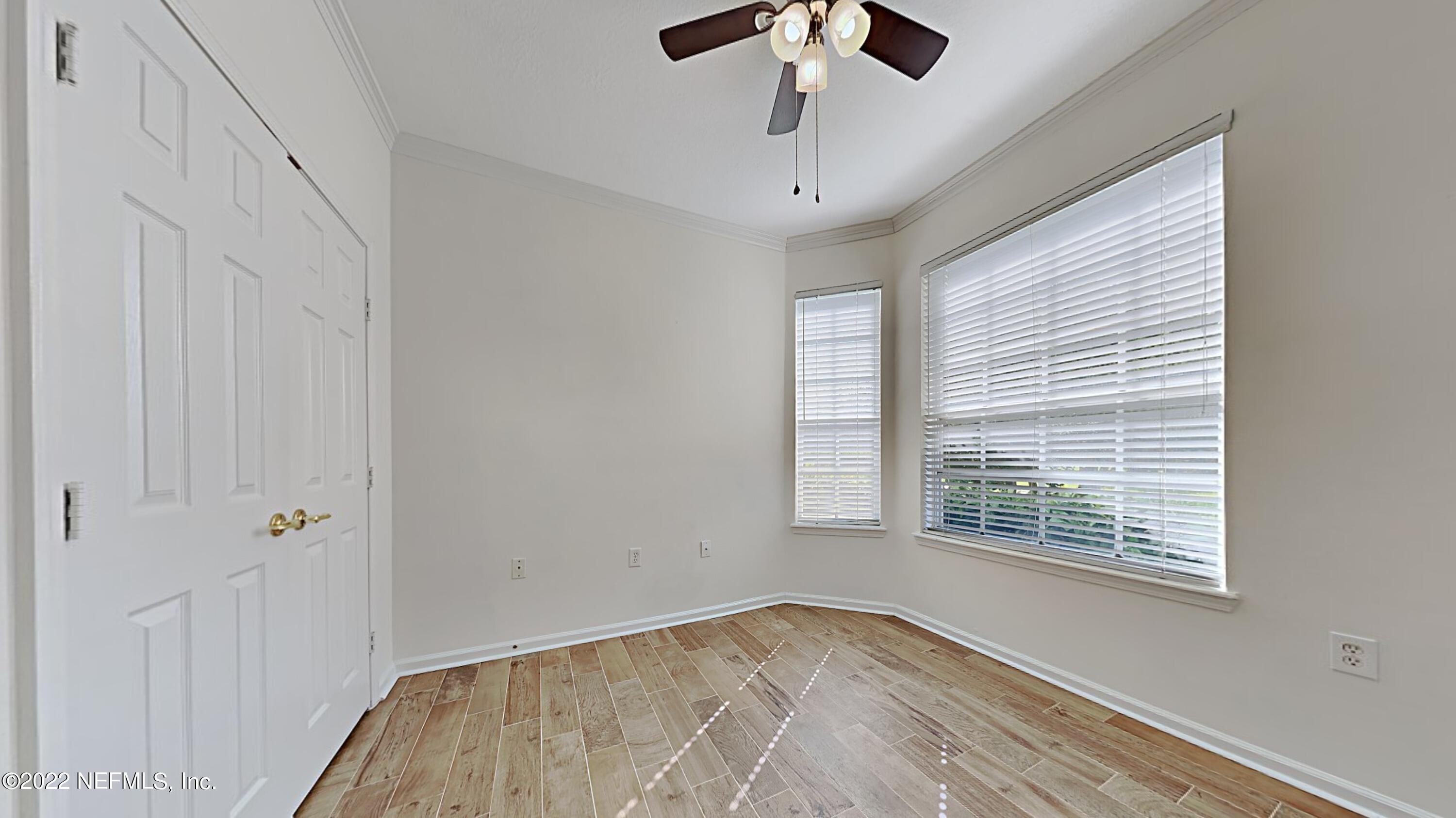7990 Baymeadows Road, Unit 201 Jacksonville, FL 32256 - Photo 12 of 14 a view of an empty room with a window