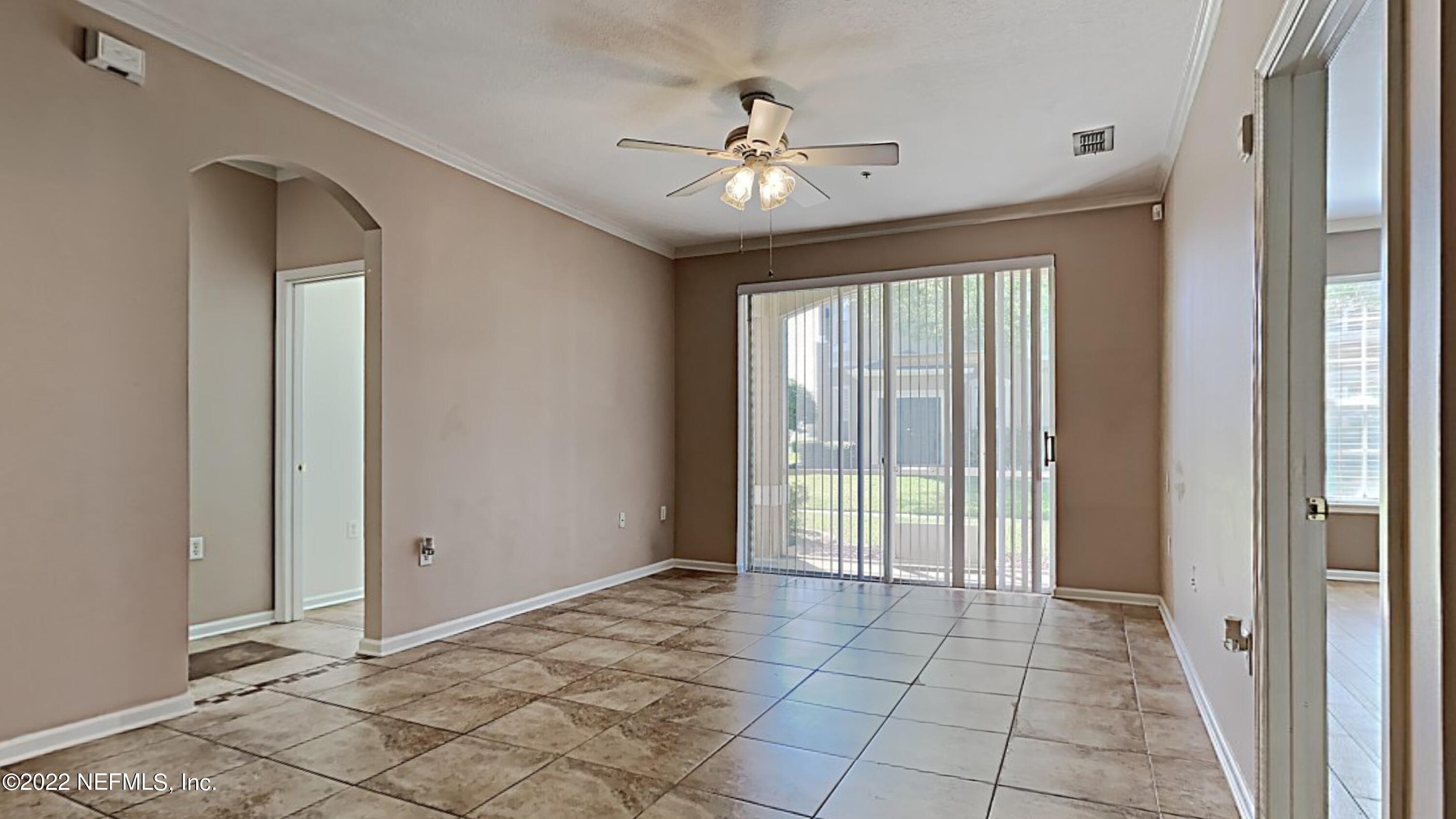 7990 Baymeadows Road, Unit 201 Jacksonville, FL 32256 - Photo 3 of 14 a view of an empty room with a window