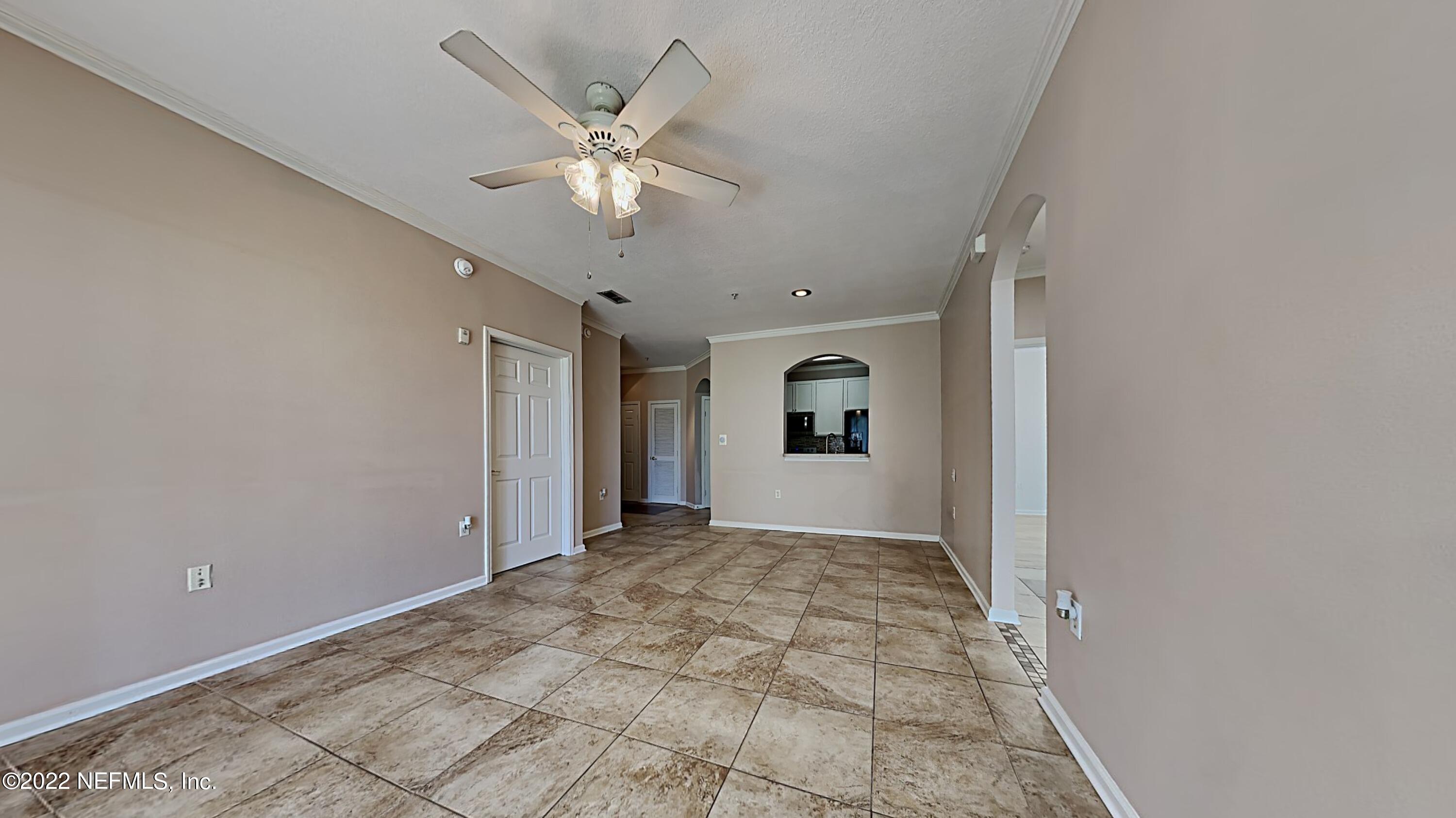 7990 Baymeadows Road, Unit 201 Jacksonville, FL 32256 - Photo 4 of 14 a view of an empty room with a window