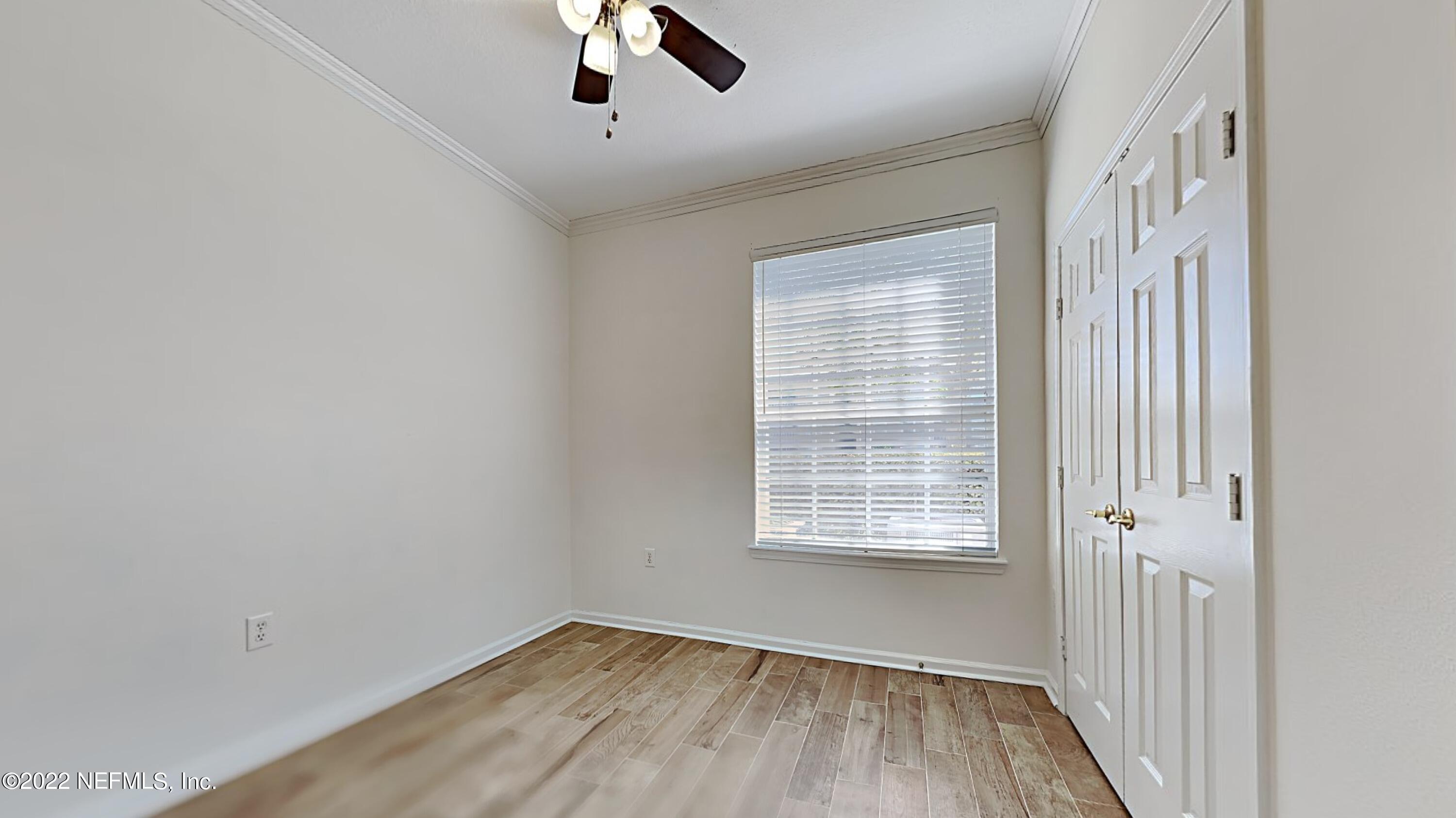 7990 Baymeadows Road, Unit 201 Jacksonville, FL 32256 - Photo 9 of 14 an empty room with windows