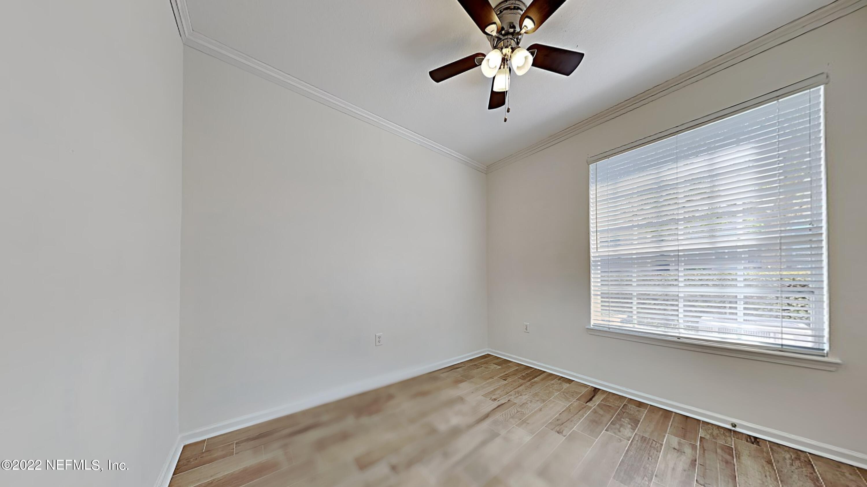 7990 Baymeadows Road, Unit 201 Jacksonville, FL 32256 - Photo 10 of 14 a view of an empty room with a window