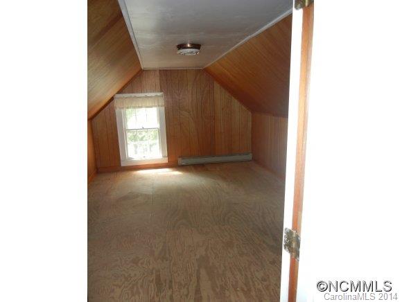 355 South Ridgecrest Street Rutherfordton, NC 28139 - Photo 19 of 24 a view of a hallway with windows